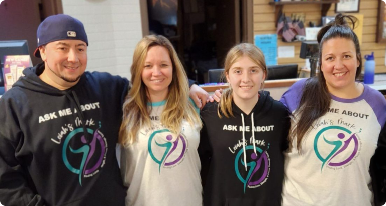 Founder and President with Treasurer, Secretary, and Founder's daughter